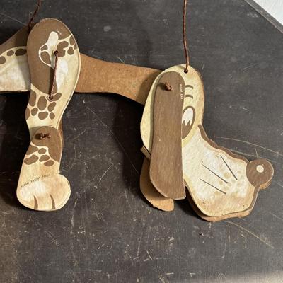 LOT 404 Well Loved Antique Toy Collection: Rudolph Steiner Co. The 15 Puzzle Bakelite Game w/Storage, Composition Doll, Nosey Hound...