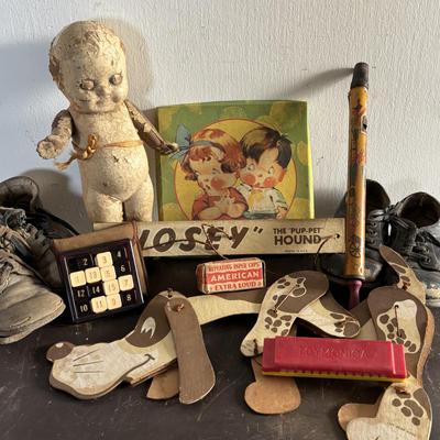 LOT 404 Well Loved Antique Toy Collection: Rudolph Steiner Co. The 15 Puzzle Bakelite Game w/Storage, Composition Doll, Nosey Hound...