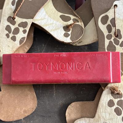 LOT 404 Well Loved Antique Toy Collection: Rudolph Steiner Co. The 15 Puzzle Bakelite Game w/Storage, Composition Doll, Nosey Hound...