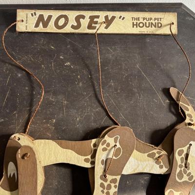 LOT 404 Well Loved Antique Toy Collection: Rudolph Steiner Co. The 15 Puzzle Bakelite Game w/Storage, Composition Doll, Nosey Hound...