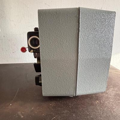 LOT 421: Vintage Eastman Kodal 32oz Darkroom Beaker, Kodak Brownie 8 Movie Projector, Brownie Holiday Camera