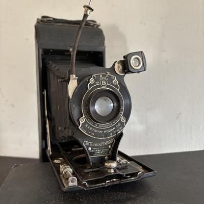 LOT 422: Vintage Kodak Collection: Dark Room Lantern, Dark Room Footed Beaker & No. 1A Pocket Camera