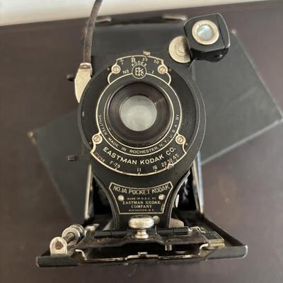 LOT 422: Vintage Kodak Collection: Dark Room Lantern, Dark Room Footed Beaker & No. 1A Pocket Camera