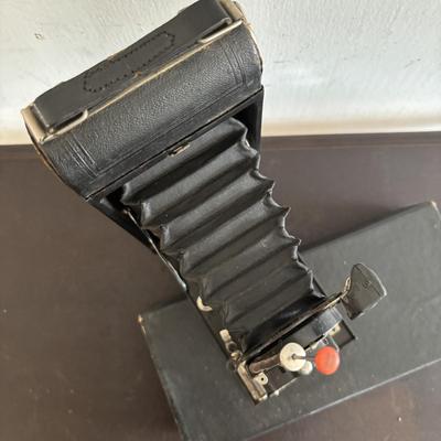 LOT 422: Vintage Kodak Collection: Dark Room Lantern, Dark Room Footed Beaker & No. 1A Pocket Camera