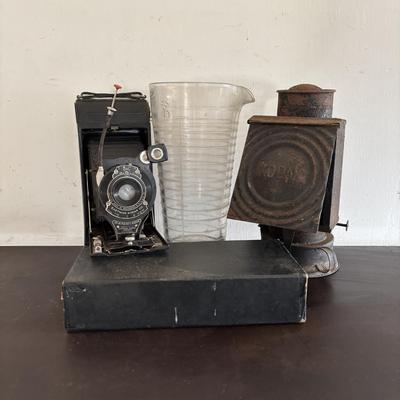 LOT 422: Vintage Kodak Collection: Dark Room Lantern, Dark Room Footed Beaker & No. 1A Pocket Camera