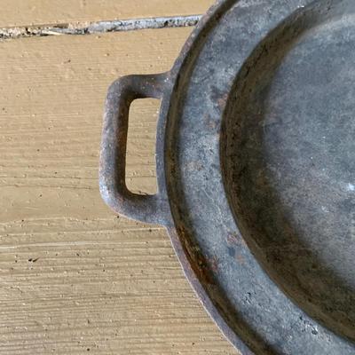 LOT 435: Antique/Vintage Long Cast Iron Oval Griddle with Spout, Oval Cast Iron Pot with Lid, Butcher's Clever with Wood Handle and...