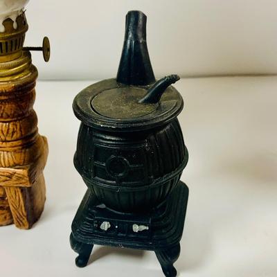 LOT441: Americana Collection Including 2 Cast Iron Miniature Cast Iron Pot Belly Stoves, a Ceramic Spinning Wheel Oil Lamp, Ceramic Owl,...
