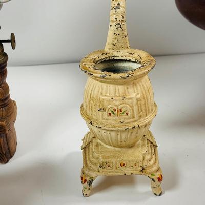 LOT441: Americana Collection Including 2 Cast Iron Miniature Cast Iron Pot Belly Stoves, a Ceramic Spinning Wheel Oil Lamp, Ceramic Owl,...