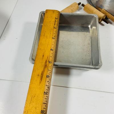 LOT444: Vintage Uranium Glass Measuring Cup, Mini Wood Rolling Pins, Mini Cake Pans, Mini Bunt Cake Pans and a Glass Hen on a Nest