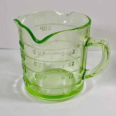 LOT444: Vintage Uranium Glass Measuring Cup, Mini Wood Rolling Pins, Mini Cake Pans, Mini Bunt Cake Pans and a Glass Hen on a Nest