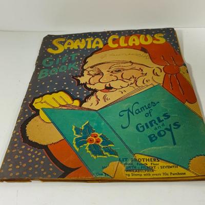 LOT 445: Vintage/Antique Composite Santa Doll, Handcrafted Wood Santa Face and a Vintage Santa Booklet