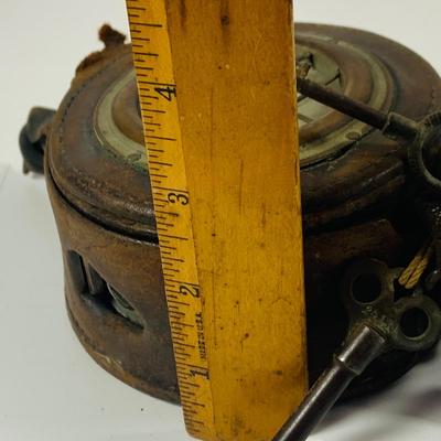 LOT:448: Antique Time Piece from the Early 20th Century In Leather Case