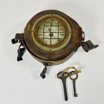 LOT:448: Antique Time Piece from the Early 20th Century In Leather Case