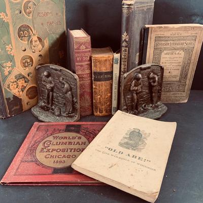 LOT 455: Collection of Antique Books and Bronze Bookends Including 1876 Old Abe by Barrett, Aesop's Fables 1844, Sketches by Boz...