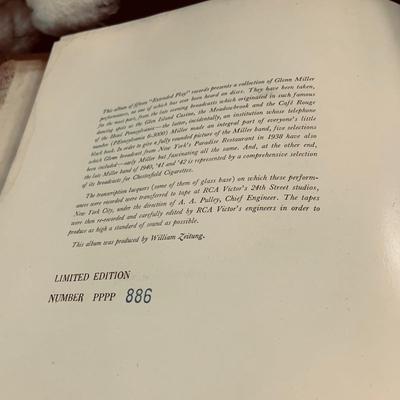 LOT 460: RCA Nipper Dog Plushes and a Book of Glenn Miller RCA 45's