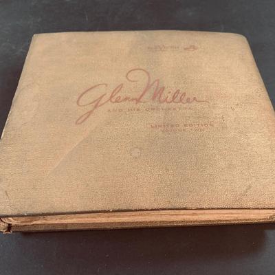 LOT 460: RCA Nipper Dog Plushes and a Book of Glenn Miller RCA 45's