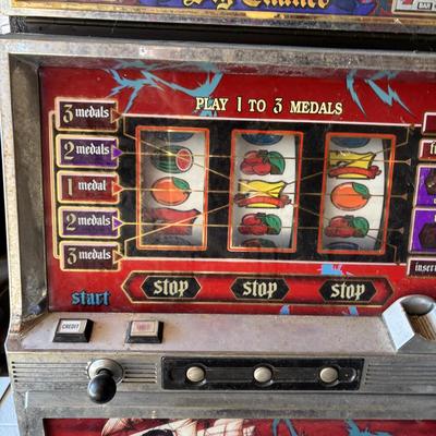 LOT 605: Vintage King of Carib Slot Machine