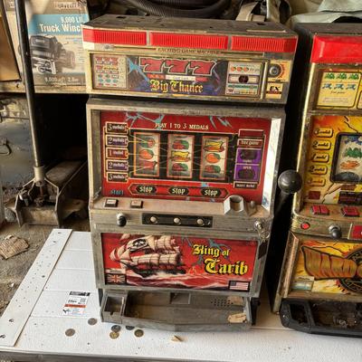 LOT 605: Vintage King of Carib Slot Machine