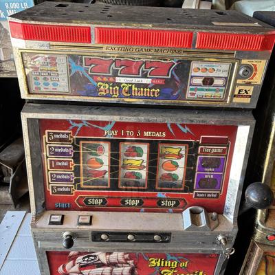 LOT 605: Vintage King of Carib Slot Machine