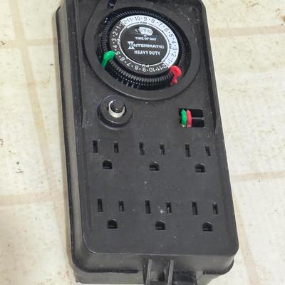 Intermatic Low Voltage Power Packs with a Timer + Motion-Activated Light (WM-DZ)