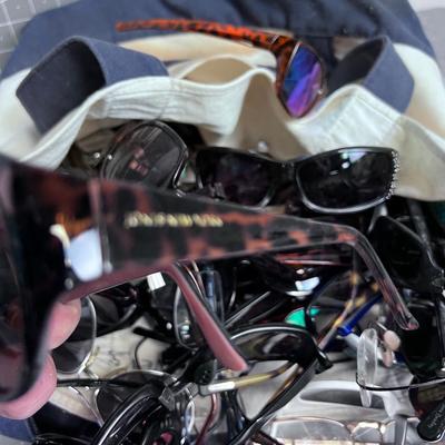 Huge pile of EYE WEAR: Sun Glasses and Readers