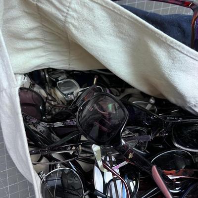Huge pile of EYE WEAR: Sun Glasses and Readers