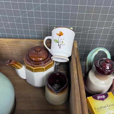 Tea and More Tea,  Teapot and Creamer Cup included. 