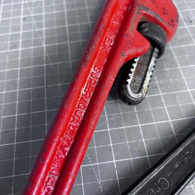 Pipe Wrench and a Crescent Wrench 