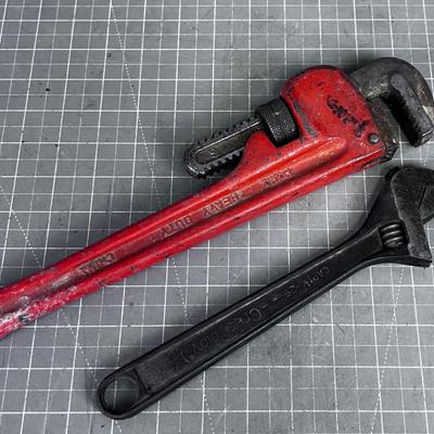 Pipe Wrench and a Crescent Wrench 
