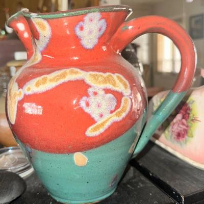 Hand thrown pottery pitcher