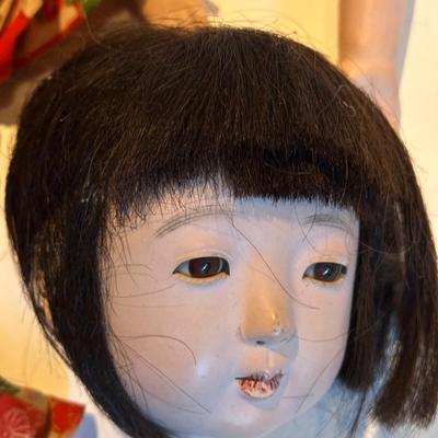 Sale Photo Thumbnail #74: Oriental doll  that needs work.