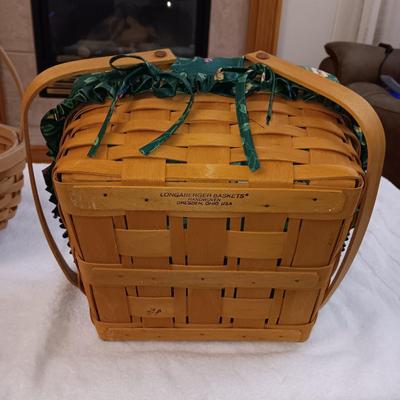 LONGENBERGER LINED BASKET W/2 HANDLES, LID AND AN INTERIOR WOODEN LIFT PLUS A 2ND BASKET