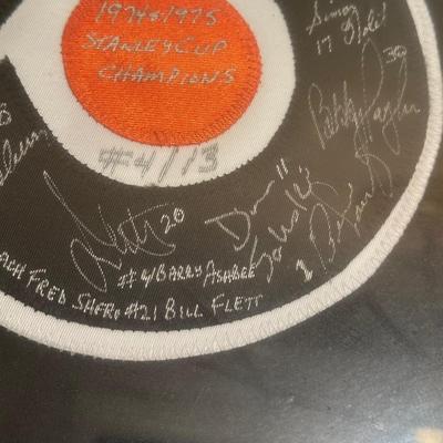 LOT 14D: Philadelphia Flyers 1974 & 1975 Stanley Cup Champions Signed & Framed Jersey
