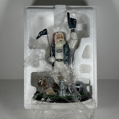 LOT 18D: The Danbury Mint Philadelphia Eagles Santa & Mrs Claus Figurines