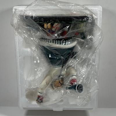 LOT 18D: The Danbury Mint Philadelphia Eagles Santa & Mrs Claus Figurines