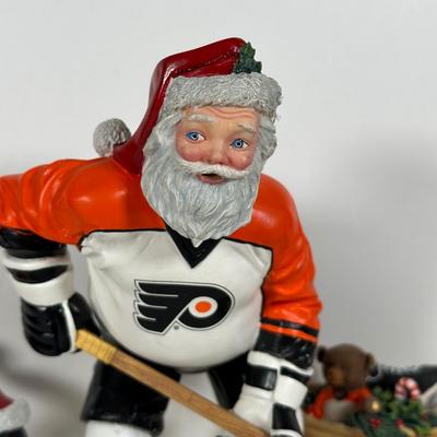 LOT 19D: The Danbury Mint Philadelphia Flyers Santa & Mrs Claus Figurines