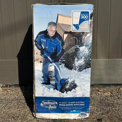 LOT 23D: Snow Joe Plus 11” Electric Snow Shovel w/ Light In Original Box