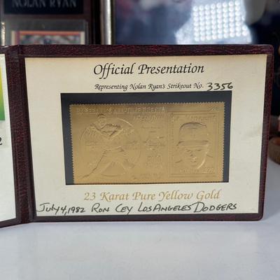 LOT 31A: Nolan Ryan Collection - Signed Ball and Pictures, Stamps, Cards & More