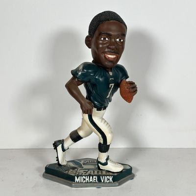 LOT 111A: Michael Vick Legends Of The Field Bobble Head & Extreme Athletes Action Figure