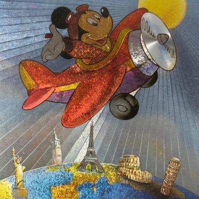 LOT 116A: Two Framed Disney Foil Artworks