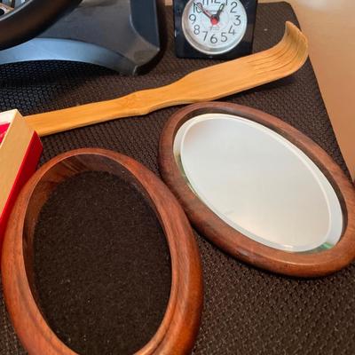 Fan, key chain, clock, back scratcher