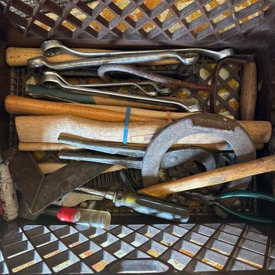 Plastic crate full of tools