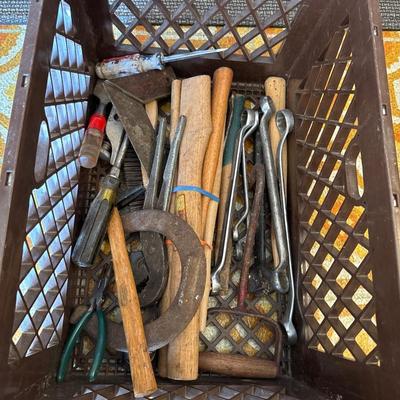 Plastic crate full of tools