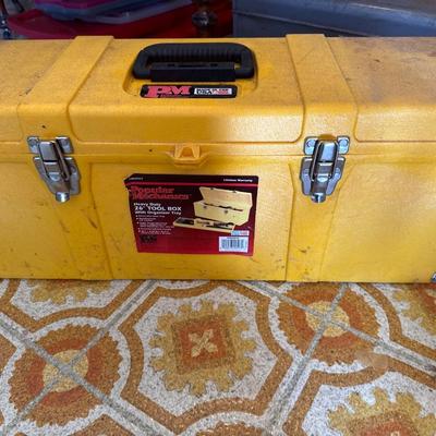 Yellow plastic toolbox with hand tools