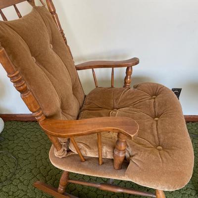 Brown cushion rocking chair