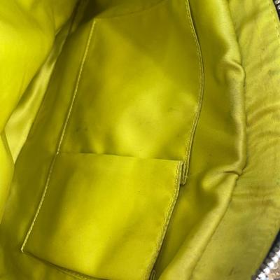 Sale Photo Thumbnail #59: Chartreuse satin lining. Fabric/trim in excellent condition .Few marks on interior and some corrosion on the zipper pull jump rings.