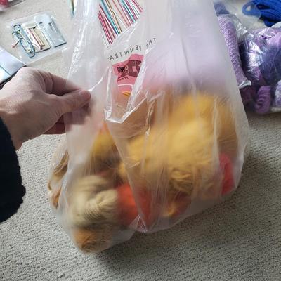 Two Tubs of Yarn and Knitting Supplies