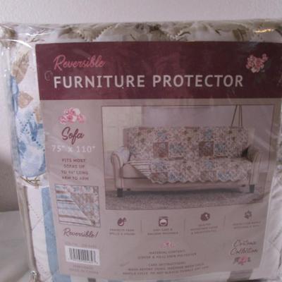 New in pkg. Reversible Sofa protector