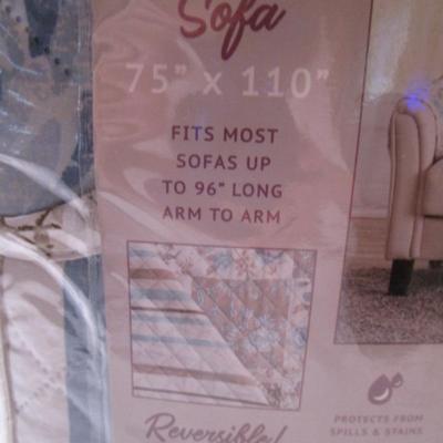 New in pkg. Reversible Sofa protector
