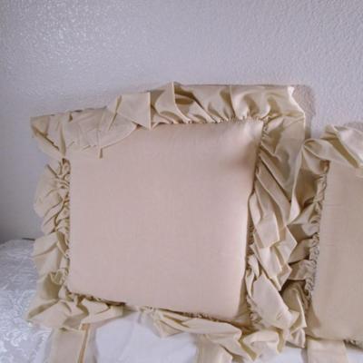 2 ruffled chair pads
